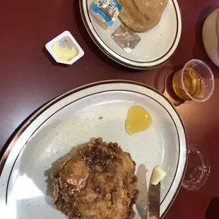 One piece of chicken and a biscuit