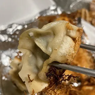 Pan fried pork dumplings- dough was undercooked