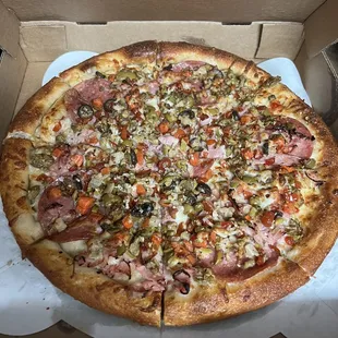 Large Muffaletta Pizza! Not on the menu but just ask! Delicious!
