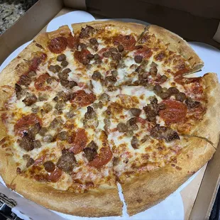 Large pizza with Pepperoni, Italian sausage and ground beef!