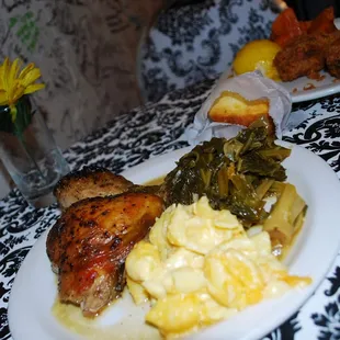 Baked chicken, greens and mac and cheese via Mama E&apos;s.