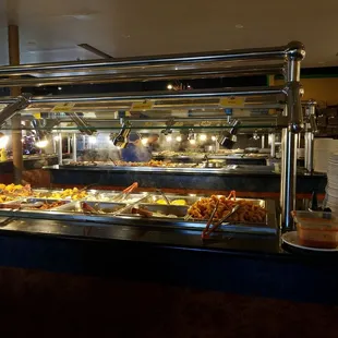 a buffet with a variety of food items
