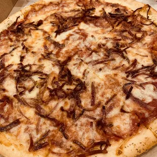 Suppose to be small cheese with bacon. Not sure what that topping is but it's not bacon.