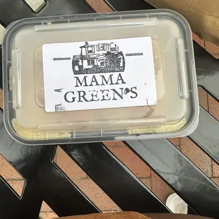 a plastic container with a sticker on it