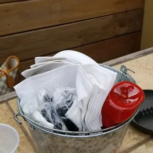 a bucket full of cleaning supplies