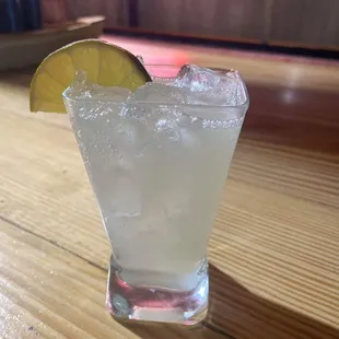 a margarita with a slice of lime