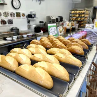 Hot fresh breads come out twice on weekdays and 3 times on the weekends... $1/each for 9in French roll and 65¢/each for mini french roll.