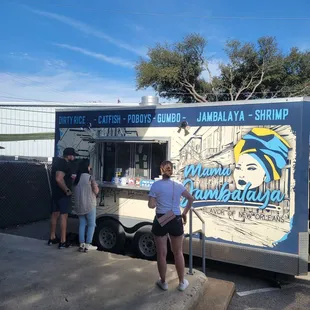 a food truck parked in a parking lot