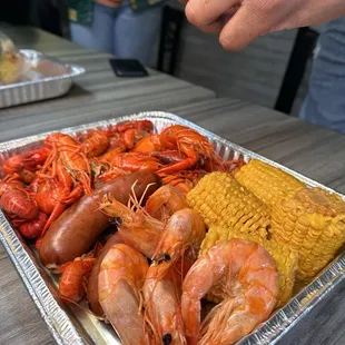 Crawfish, shrimp, sausage, corn