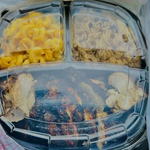 Jerk Chicken Dinner (Take-out) two sides, Mac and cheese and rice and peas