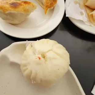 three plates of food on a table