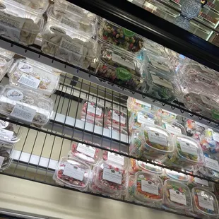 a display case filled with pies
