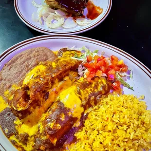 Beef Enchilada &amp; Pork Tamale combo with a side of Pork Ribs