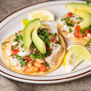 a plate of fish tacos