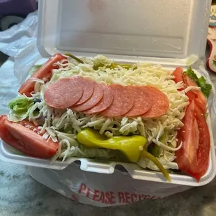 a sandwich in a styrofoam container