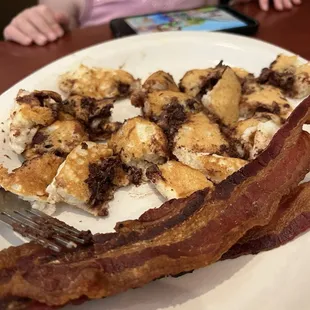 Chocolate chip pancakes with crispy bacon