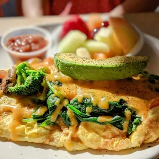 Veggie omelette with avocado and house salsa.