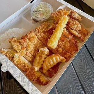 Best seller Pork Katsu - comes with gyoza, shrimp tempura, coleslaw, pickled veggies &amp; rice