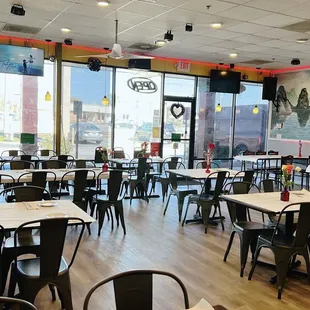 a restaurant with tables and chairs