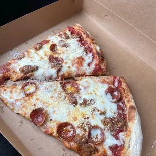 2 slice of pepperoni.  Great crust, sauce toppings all in all great slice.