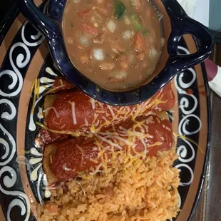 Chicken enchiladas with borracho beans and rice