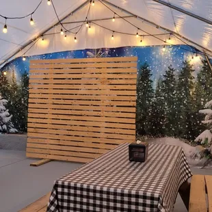 a picnic area with tables and benches