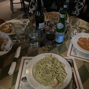 a table full of food and drinks