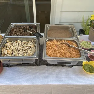 Chicken breast, carne asada, rice, beans, guacamole and their famous salsa!