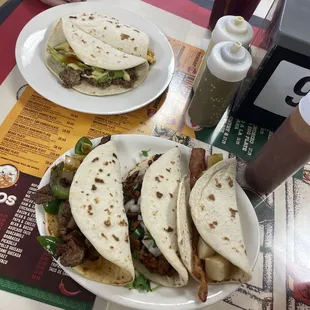 These tacos are massive. Fajita ala Mex, al pastor, papa con tocino.