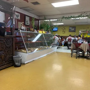 Baked goods display and some dining room