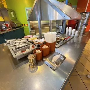 a kitchen counter with a variety of food items