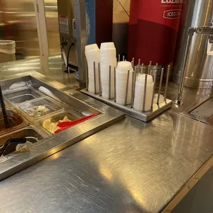 a counter with a variety of condiments