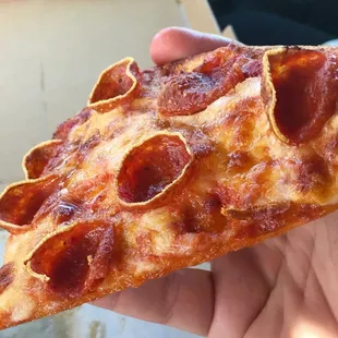 Mama Mary's thin crust pizza, topped with octopus's suction cups...uh..I mean pepperoni.