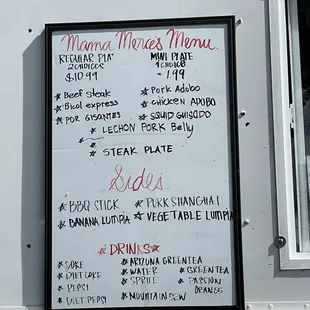 a menu on the side of a food truck