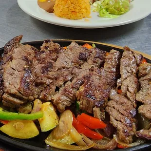 THE ABSOLUTE BEST TENDER, JUICY GRILLED STEAK FAJITAS ,only At MAMA MIA mexican cuisine Come try today!!