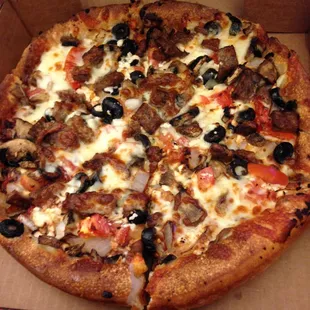 I ordered the Greek Pizza with Mushrooms added. It was very good! Lots of toppings and the crust was just right!