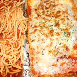 a plate of spaghetti and meat