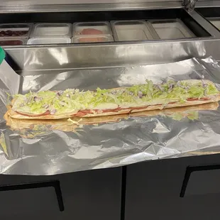 Foot long Italian sandwiches ham and salami and cheese for only $ 17.95