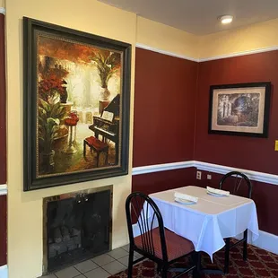 a dining room with a fireplace