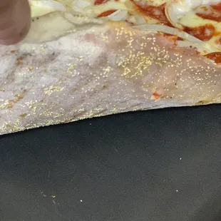 So thin that toppings bled through
