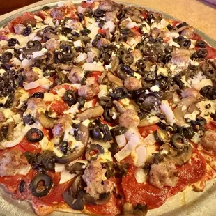 Cheese, sausage, pepperoni, onion, mushroom, black olive