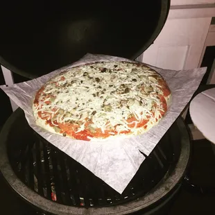 Take and bake on the big green egg.