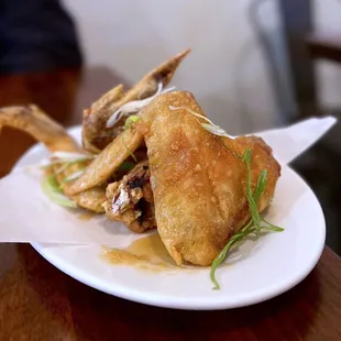 Mama Mu's Wings: Deep-fried wings w/ garlic, fish sauce | 3 pc - $12