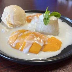 The mango is perfectly ripe, rice is warm and cooked just right and coconut cream  goes well with it.