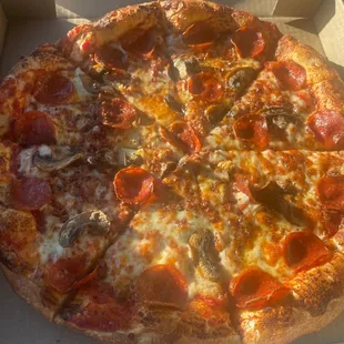 Mushroom, bacon, pepperoni pizza