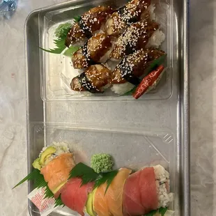 two trays of food on a table