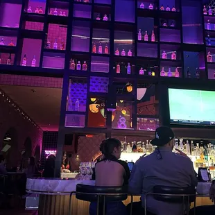 Bar continues to the back side with more seating!