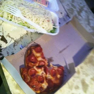 a slice of pepperoni pizza