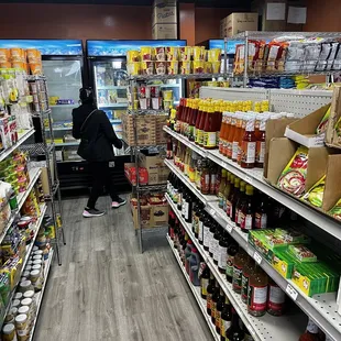 a woman shopping in a grocery store