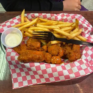 Boneless wings and fries.